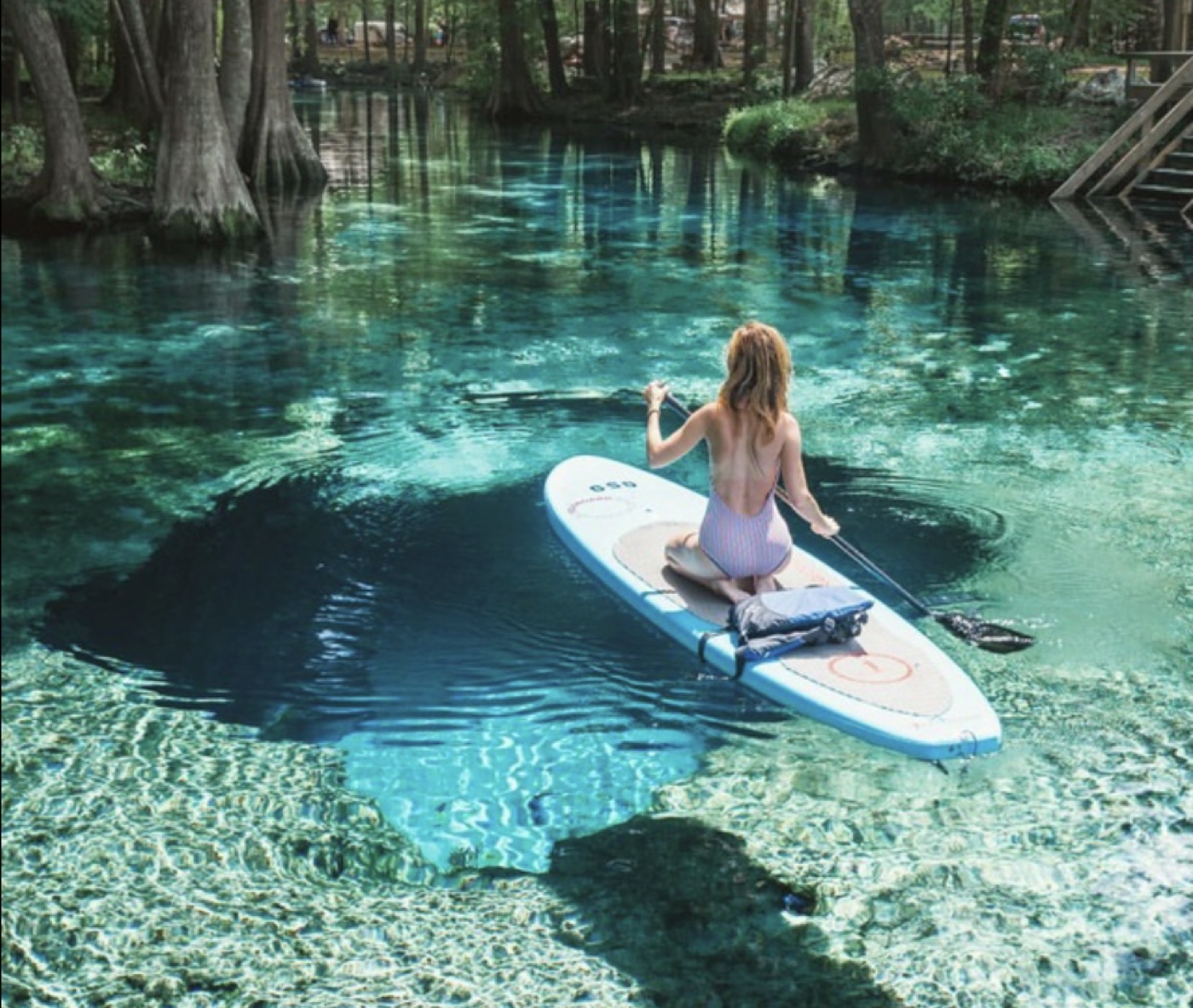 Paddleboarding over the crystal clear spring at Ginnie Springs